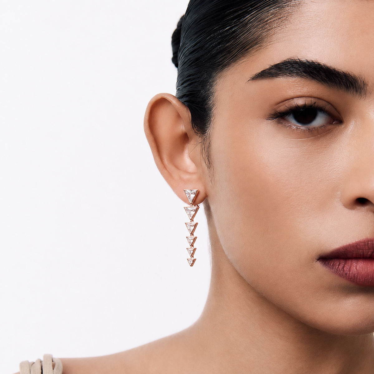 Les boucles d’oreilles Triangoli